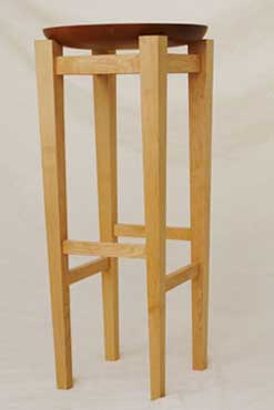 table in maple with hand-carved cherry bowl top